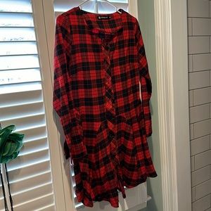 Plaid dress in red and black color.